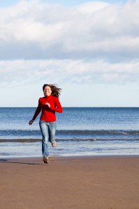 young-woman-running-11297693309A8p