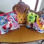 Mano pirmosios pagalvėlės puošia vyro drabužių parduotuvę.